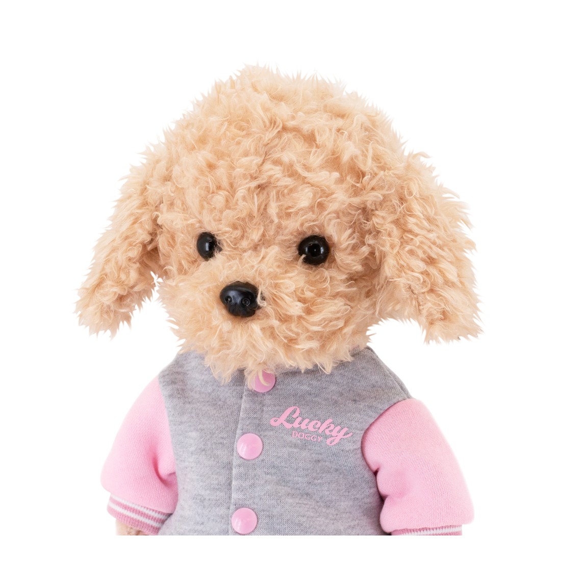 Peluche Lucky Doggy debout en veste universitaire rose et pantalon en jean clair. Peluche Lucky Doggy debout en veste universitaire rose et pantalon en jean clair.