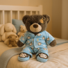 Teddy bear wearing light blue pajamas with monkey pattern and slippers – outfit for 40 cm plush toy