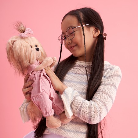 Lucky Yoyo Comfortable Walk Ref. LD3/108 wearing pink jumpsuit and matching bow.