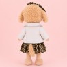Plush dog in leopard dress, white zip jacket and matching headband